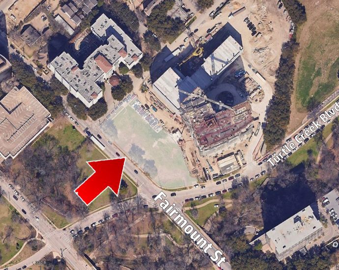 Aerial view of the future site for Vivante Turtle Creek, highlighted with an arrow, showing its proximity to ongoing construction and the surrounding neighborhood in Dallas, Texas.